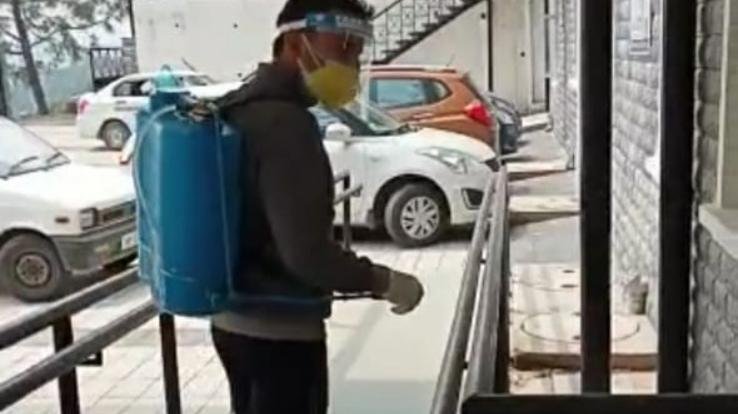 doctor sanitizing hospital