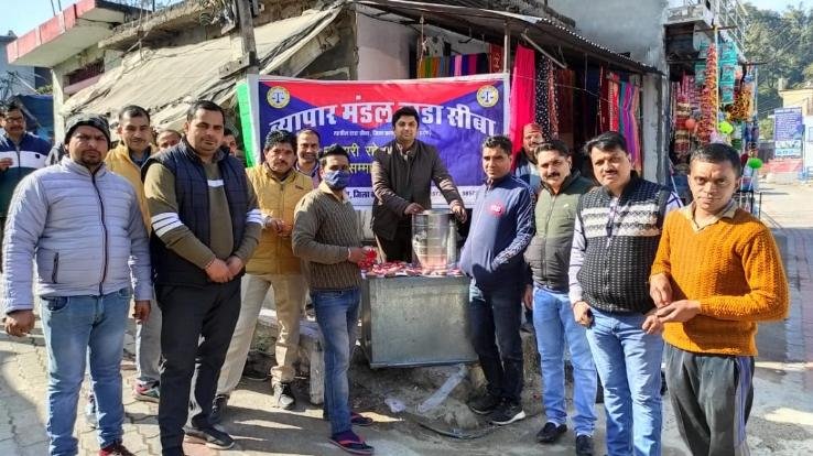 Kangra: Dada Siba Business Board celebrated the new year by distributing pudding