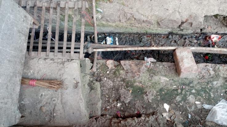 Dirt stuck in the drains of gate number-2 made life difficult for the shopkeepers