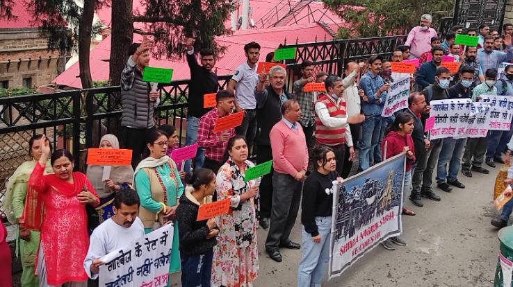 People protested outside the Deputy Commissioner's office regarding huge water bills