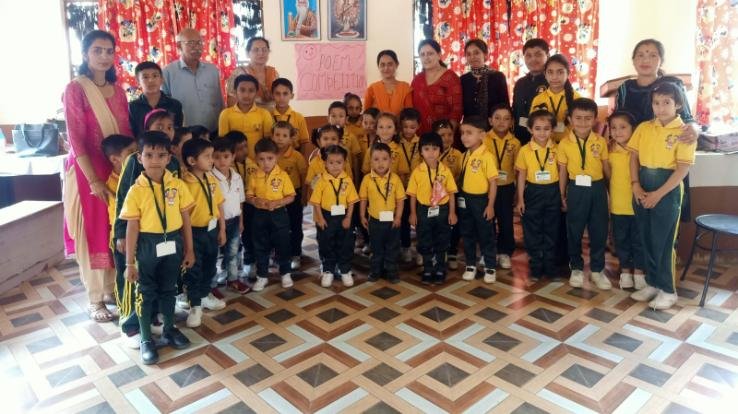 Reading poems composed by Gurudev Rabindranath Tagore in Shamati School