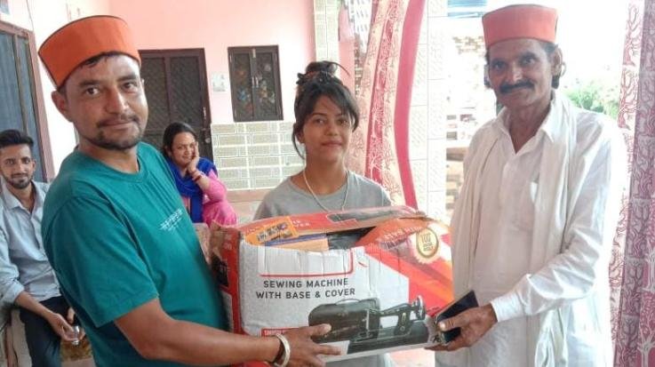 Social worker Mukesh Thakur presented books to children