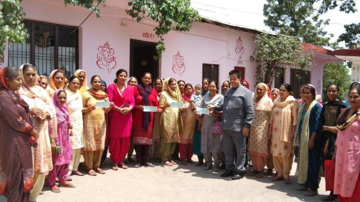 Ten-ten checks are being given to women's boards from MLA's pension