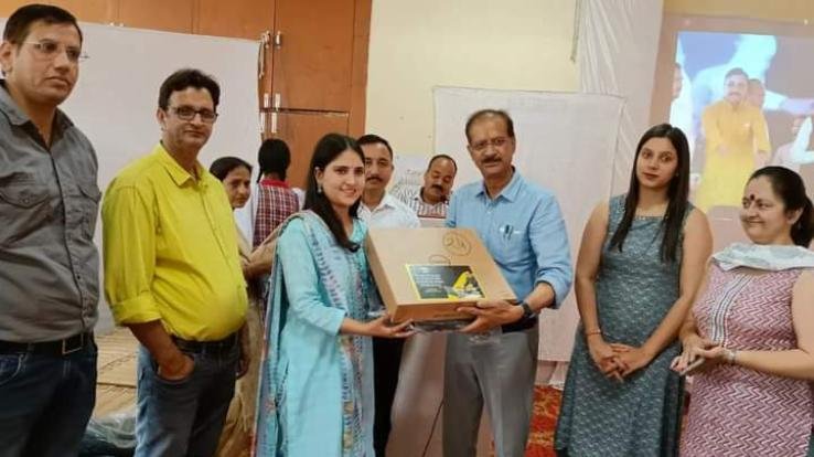 Distributed laptops to meritorious students: Ravindra Dhiman