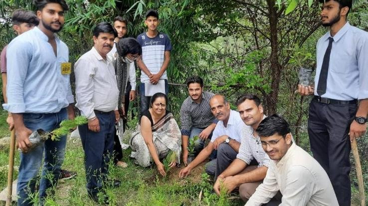 Students planted saplings for development in Palampur on Kargil Day