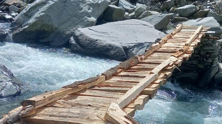 Construction of two wooden bridges connecting Bada Bhangal area