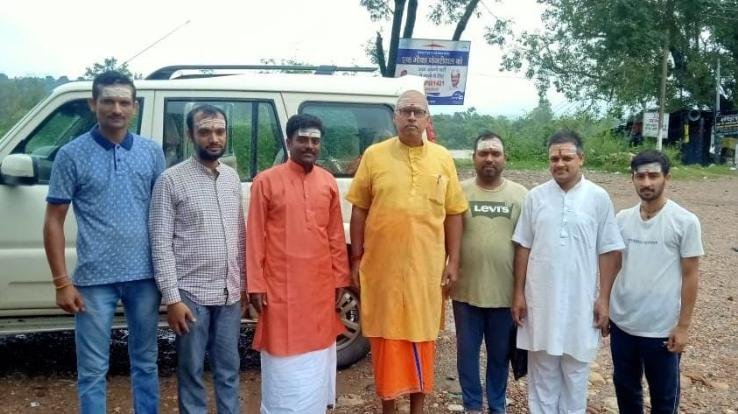 Director of Central Sanskrit University, Balahar, Prof. Madan Mohan Pathak completed the act of bathing