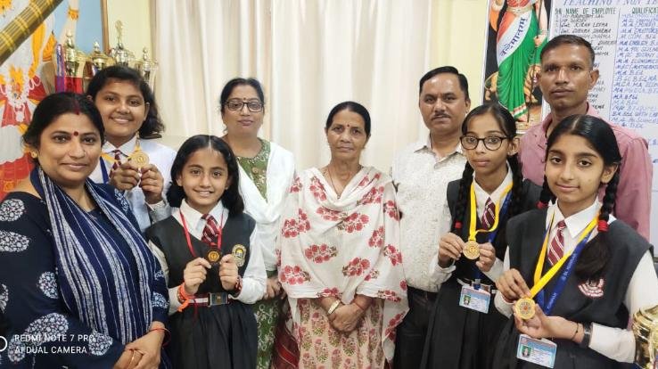 Girls of BL School won the shot put and chess in Anjar-14 district level sports competition