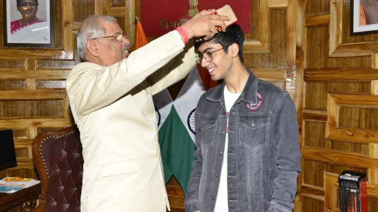 Governor honored NEET topper at Raj Bhavan