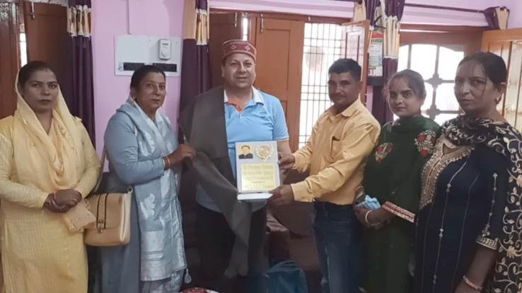SMC honored manager Pradeep Sharma, who represented India in weightlifting