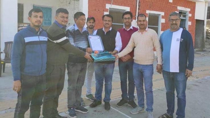 Principal Dr. Ganesh Dutt Sharma was honored by the Board of Trade