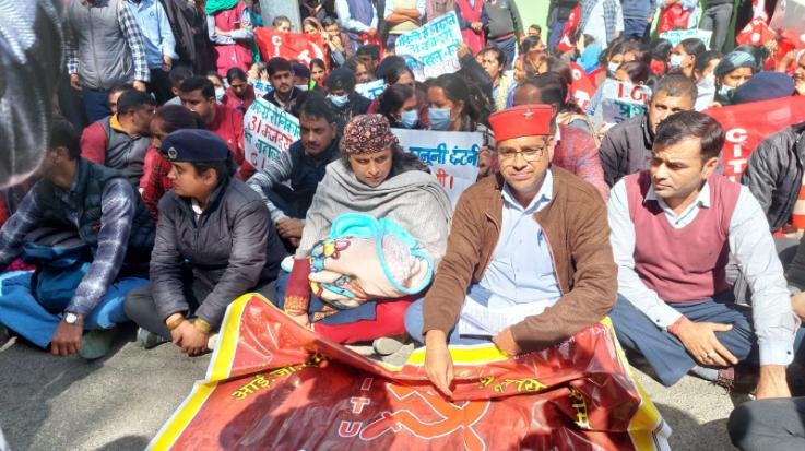 Woman fired from job sitting on strike with two month old baby