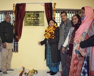 Minister Sarveen Choudhary inaugurating the community hall at Kuthehar, Shahpur.