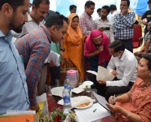 Sarveen Chaudhary distributed checks to the eligible beneficiaries of various schemes