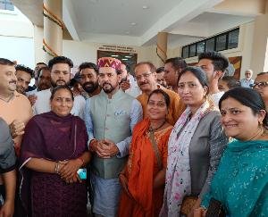 Compassionate dependents of Palampur Agricultural University narrated grief to MP Anurag Thakur