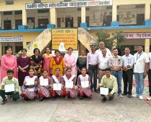 Distribute certificates to meritorious students