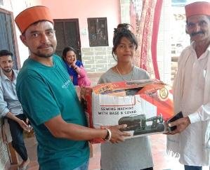 Social worker Mukesh Thakur presented books to children