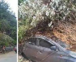 Car damaged after being hit by debris