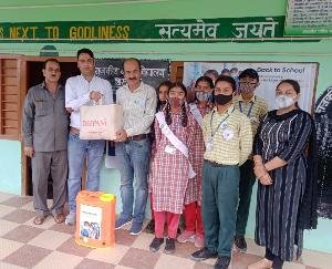 Sanitizer kit and other material presented by HMIF branch Solan to Shardaghat school