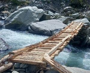Construction of two wooden bridges connecting Bada Bhangal area