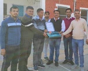 Principal Dr. Ganesh Dutt Sharma was honored by the Board of Trade