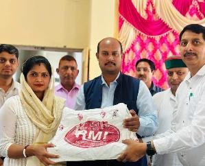 MLA Goma presented sewing machines to 123 eligible beneficiaries