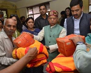  Governor distributed relief material to the affected people of Krishna Nagar