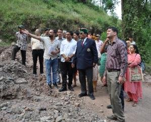 Dr. Shandil inspected the landslide area caused by rain in Badlyana village of Anji.