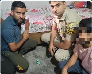 Hamirpur police arrested a person with 2.42 grams of heroin.