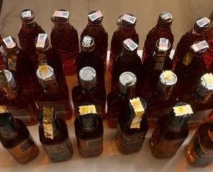 Kangra_Police_raid_illegal_liquor_in_Nagrota_Bagwan_10_boxes_recovered