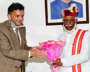 Chairman and member of Public Service Commission meet Governor